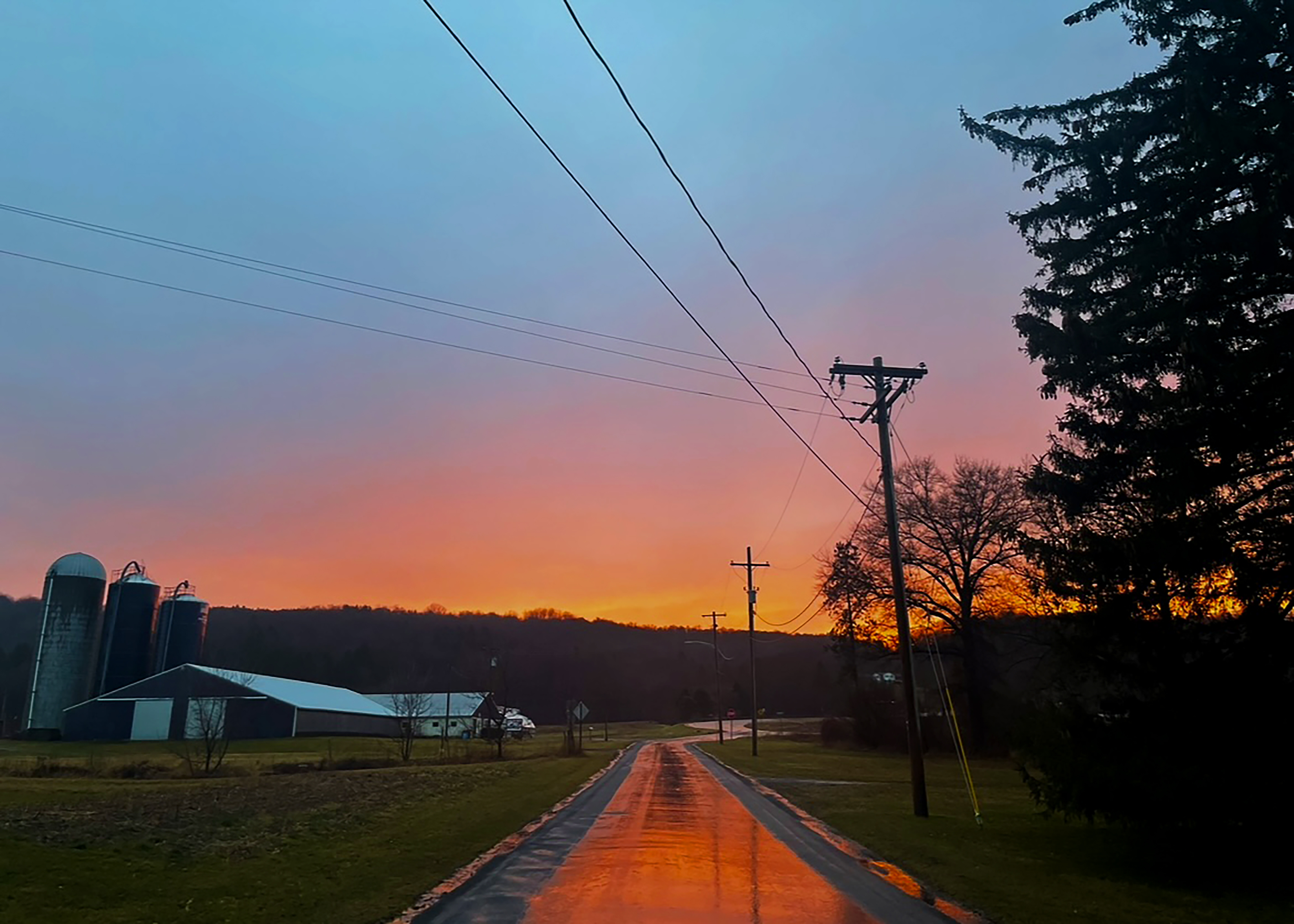 first place winner, grade 7-8: hailey schrader (picture of sunset over farm)