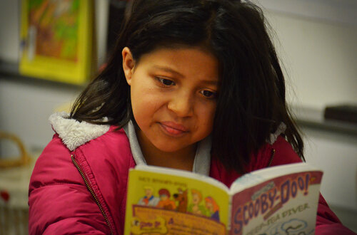Yasmin Gonzalez reads a fun mystery during her independent reading time. Yasmin Gonzalez reads a fun mystery during her independent reading time.