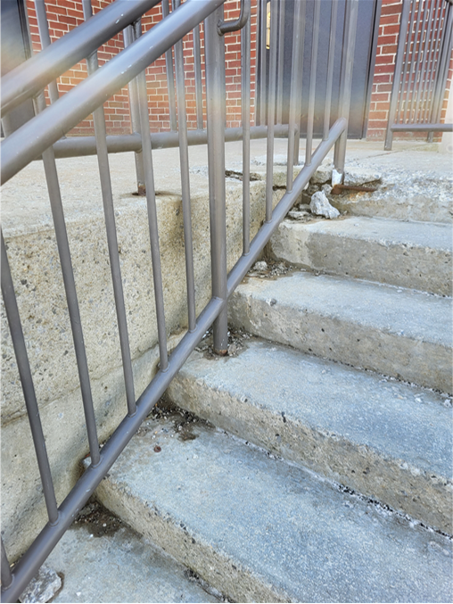 Deterioration of High School ramp at front entrance
