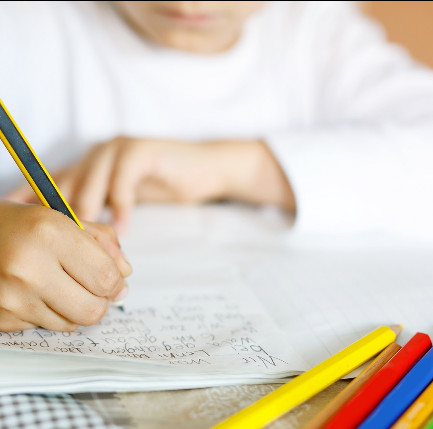 Student writing a story