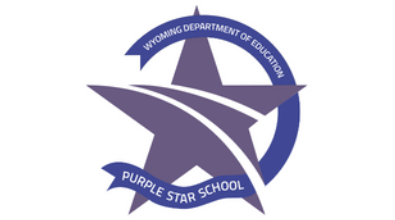WDE Purple Star Logo - Purple Star Program (purple star with a purple ribbon woven around the star - on top it has Wyoming Department of Education and on bottom of ribbon it has Purple Star School.