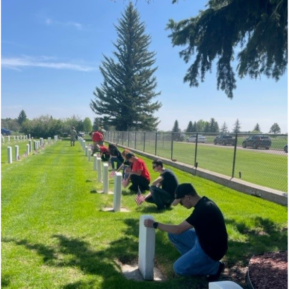 Placing of Memorial Flags at the Cemetery located at F.E. Warren AFB.