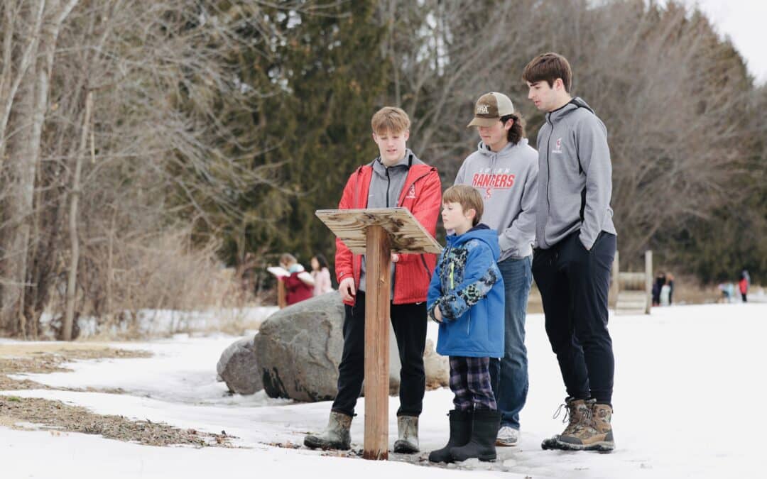 North Woods hosts story walk with Logan athletes