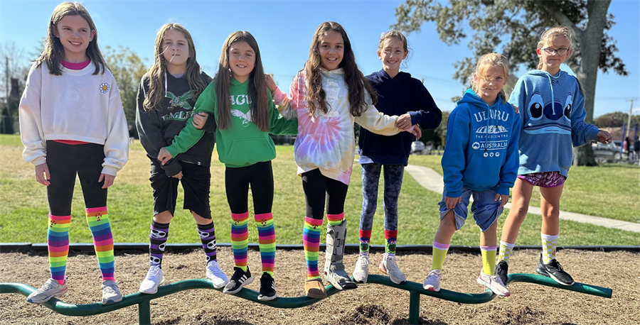 Belhaven girls sport crazy socks on the playground