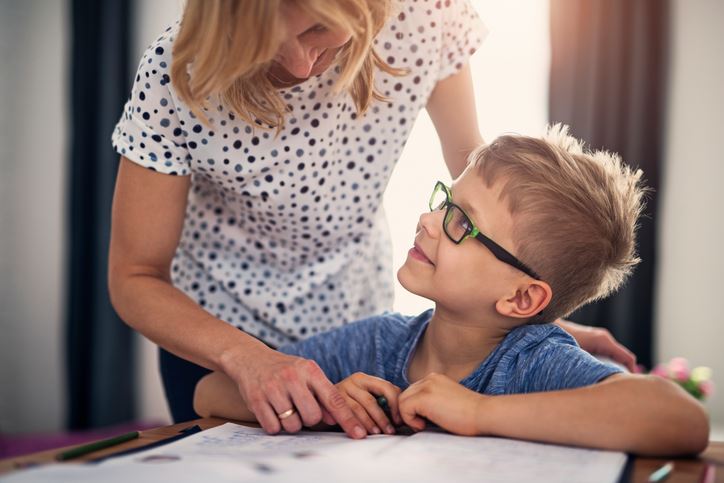 Parent helping child