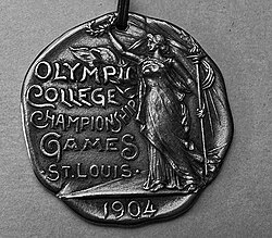 Gold medal in college basketball from the 1904 Olympic Games.