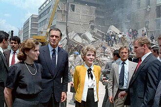 First ladies Paloma Cordero of Mexico (left) and Nancy Reagan of the United States (right) with U.S. Ambassador to Mexico, John Gavin observing damage from by 1985 Mexico City earthquake, 1985.