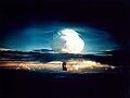 Image 42The mushroom cloud from the Ivy Mike nuclear test, one of two tests conducted as part of Operation Ivy at the Pacific Proving Grounds on Elugelab in the Marshall Islands. Mike was the first successful full-scale test of a multi-megaton thermonuclear weapon, and it left an underwater crater 6,240 ft (1,900 m) wide and 164 ft (50 m) deep where the island had been.
