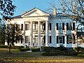 The Pillars is a Greek Revival Antebellum plantation home that was built in 1857 by Archibald Tyson, a cotton planter from North Carolina.