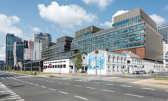 Wola, once an industrial district, is now becoming the business center of the capital.[172] The photo shows the revitalized Norblin Factory.