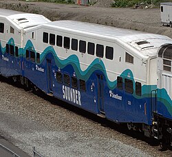 A double-decker passenger car in the Sounder livery