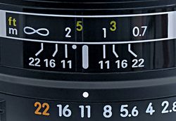 Detail from a lens set to f/11. The point half-way between the 1 m and 2 m marks, the DOF limits at f/11, represents the focus distance of approximately 1.33 m (the reciprocal of the mean of the reciprocals of 1 and 2 being 4/3).