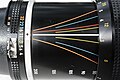 Close up of Nikon 80-200 f/4 zoom lens showing the color-coded depth-of-field lines