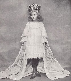 Young girl in stage costume as a queen
