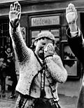 Image 8 German occupation of Czechoslovakia Photo credit: Völkischer Beobachter A crying Sudeten woman salutes Adolf Hitler as German forces sweep into Czechoslovakia, October 1938. Originally published in the Völkischer Beobachter, it supposedly showed the intense emotions of joy which swept the populace as Hitler drove through the streets of Cheb, 99% of whose inhabitants were ardently pro-Nazi Sudeten Germans at the time. In contrast, when the photo was published in the U.S., it was captioned, "The tragedy of this Sudeten woman, unable to conceal her misery as she dutifully salutes the triumphant Hitler, is the tragedy of the silent millions who have been 'won over' to Hitlerism by the 'everlasting use' of ruthless force." It is unknown what the true circumstances surrounding the photo are. More featured pictures