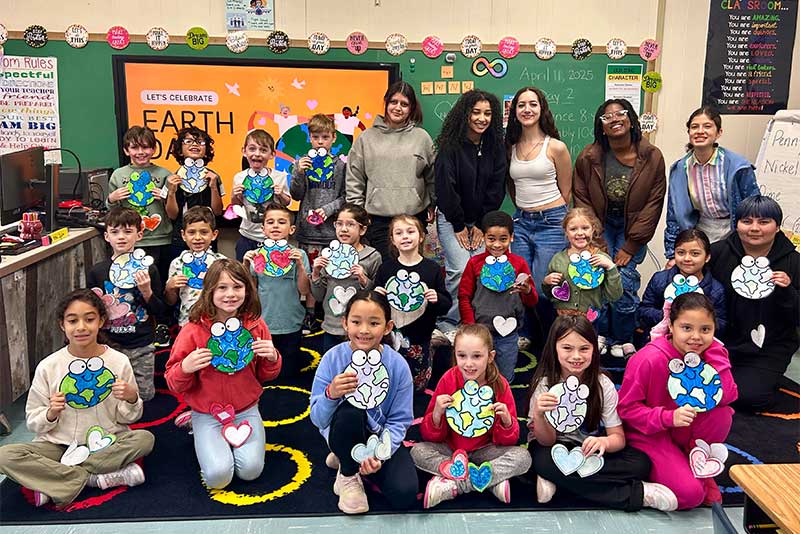 Members of the Lynbrook High School Culture and Diversity Club, along with their advisor Karen Smith.