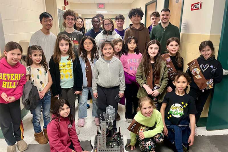 Girl Scouts Brownie Troop 2600, comprised of 20 third graders who attend all three Lynbrook elementary schools, along with High School Robotics Club.