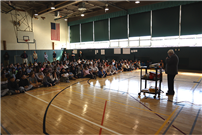 speaker at North Middle School speaking to students thumbnail264925