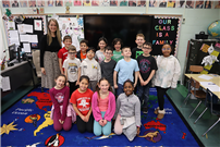 Chelsea Gundrum, pictured with her third grade class thumbnail265569