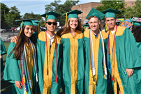 Photo of five graduates in caps and gowns thumbnail187787