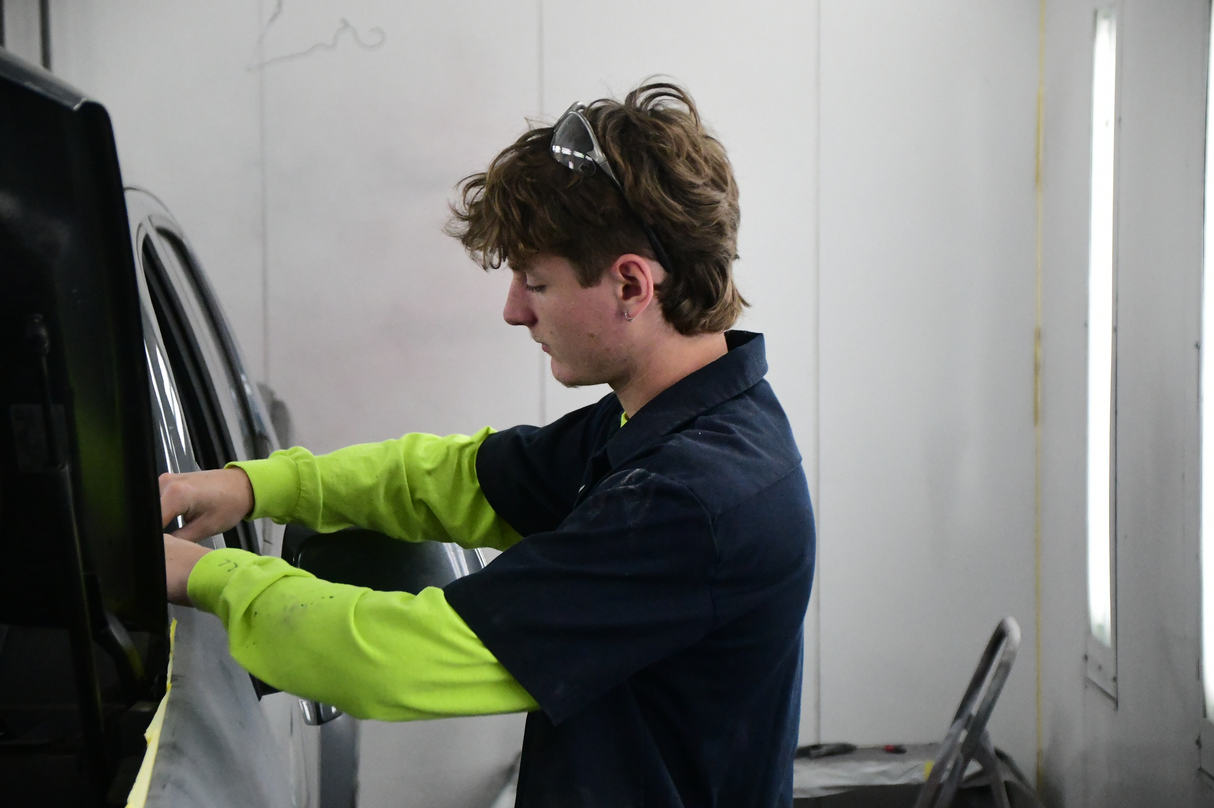 Collision Student Prepares Bodywork For Paint