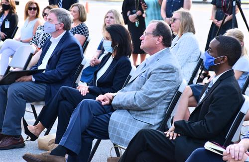 Mayor Tommy Battle and superintendents from Huntsville, Madison County and Madison City seated in front row