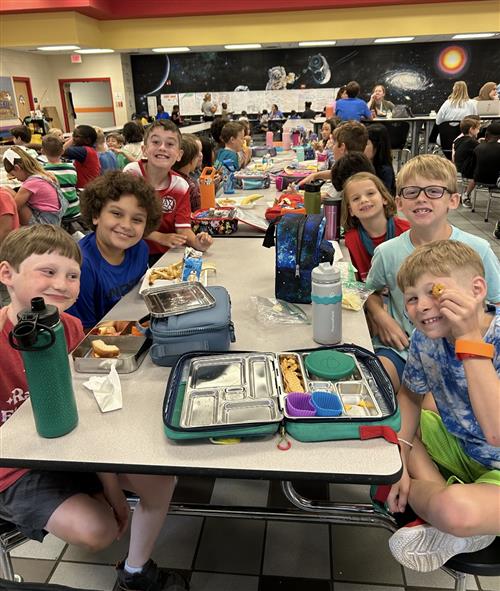 students at lunch in the Rainbow Elementary cafeteria