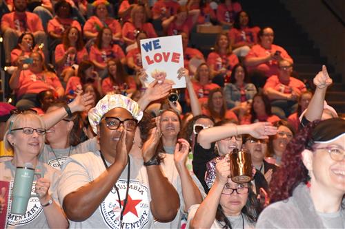 crowd shot of cheering teachers