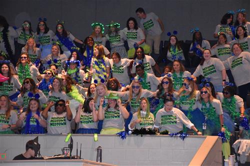 crowd of teachers cheering