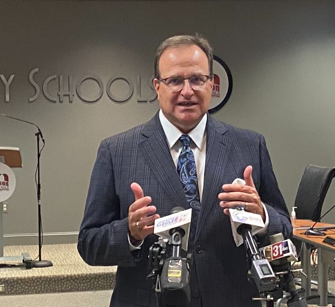  Dr. Ed Nichols in front of mics at podium