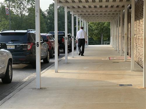 Dr. Nichols walking the car line at Columbia Elementary