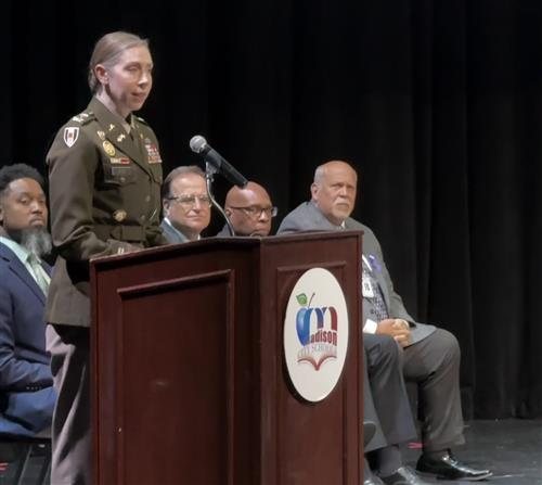 Redstone Garrison Commander at podium with superintendents in background