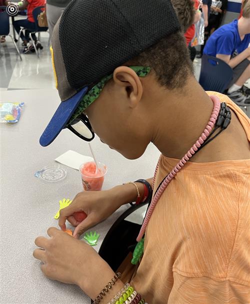 student doing hands on lesson