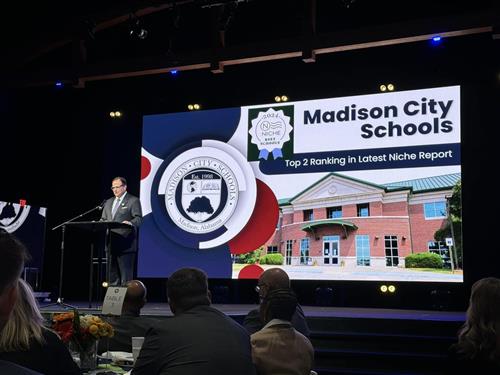 Dr. Nichols on stage opening the ceremony