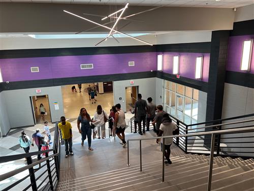 main stair landing with people