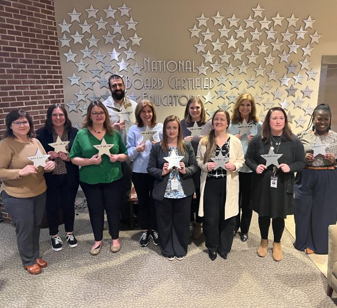  group photo of 11 National Board Certified Teachers