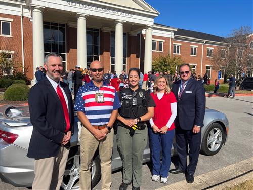 Veterans who work at Mill Creek Elementary shown with Principal Nathan Wilson and Superintendent Dr. Ed Nichols
