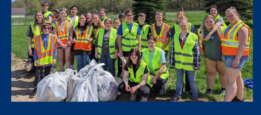 FFA members cleaning up trash on their section of highway G.