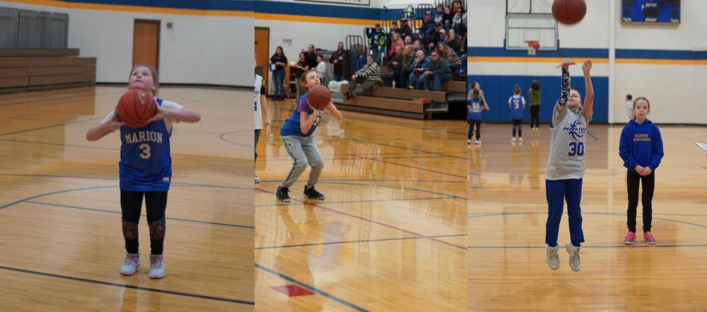 Top winners in free throw contest in gym class showing off their skills at half time of a boys game 2022