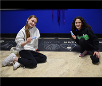 Two students drawing with chalk thumbnail265055