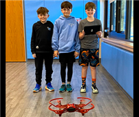 3 Students operating drone in the halls thumbnail264666