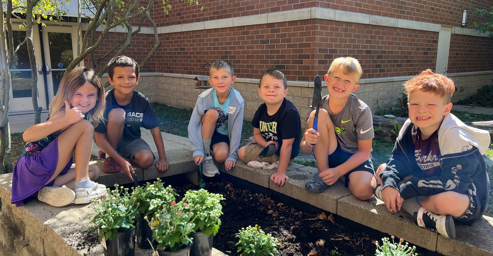 MTES students working in the garden