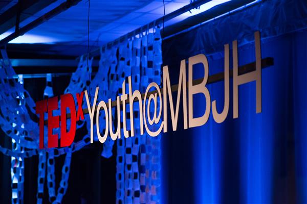 The TEDx sign, displayed at every event since the first. hangs over the stage from at TEDxYouth@MBJH 2018..