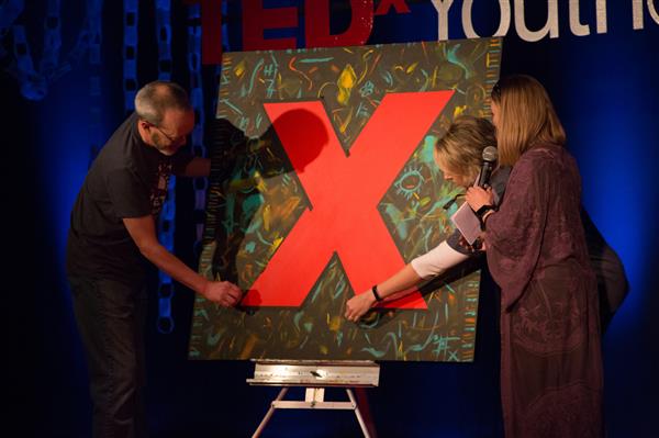 The audience-interactive painting is unveiled at TEDxYouth@MBJH 2018.