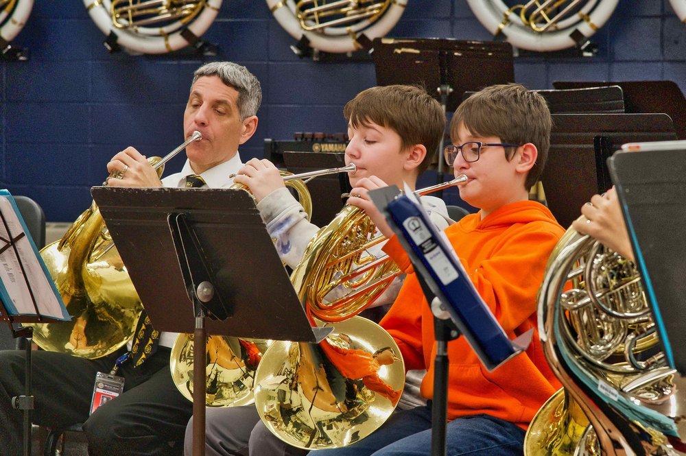 students rehearsing for horn day