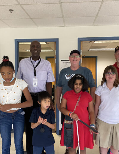 Five MSB students stand with Mr. Spann and two members of Colonial Heights Baptist to say thanks for the water donation.