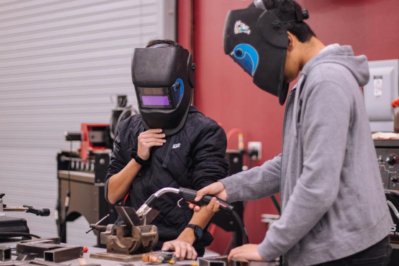 two students in welding class