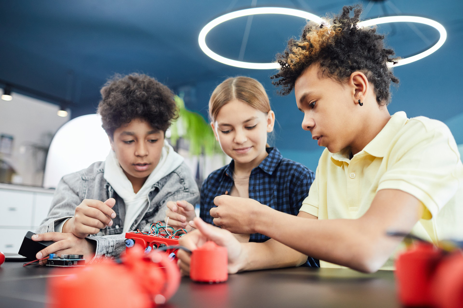 A group of children are working on a project together.