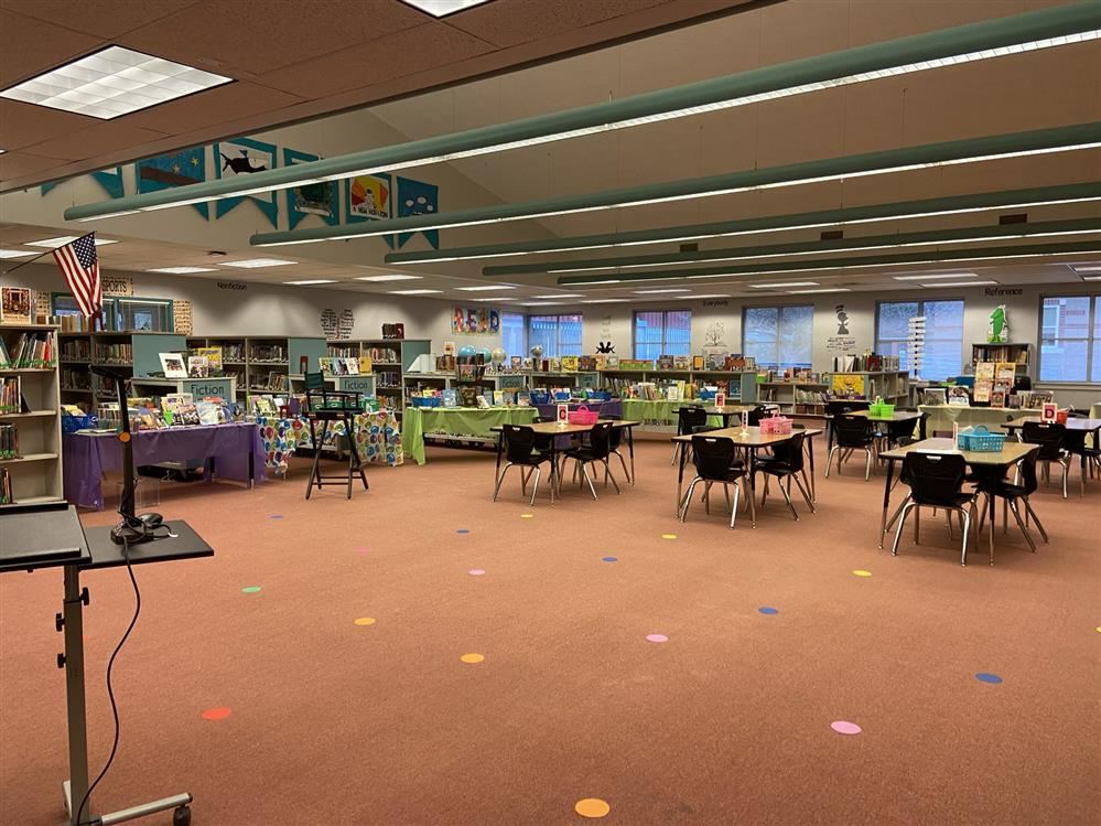 The Horizon Elementary Library, overlooking tables and shelves in the background.