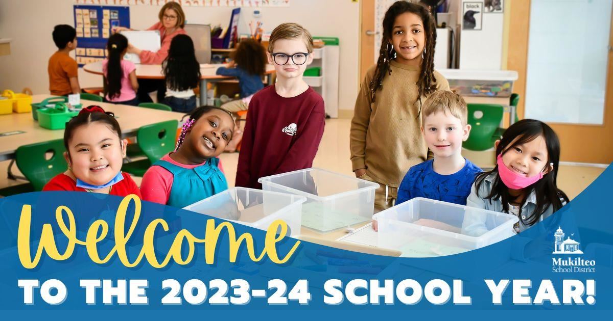 Diverse group of elementary students in a classroom smiling with the words Welcome to the 2023-24 school year!